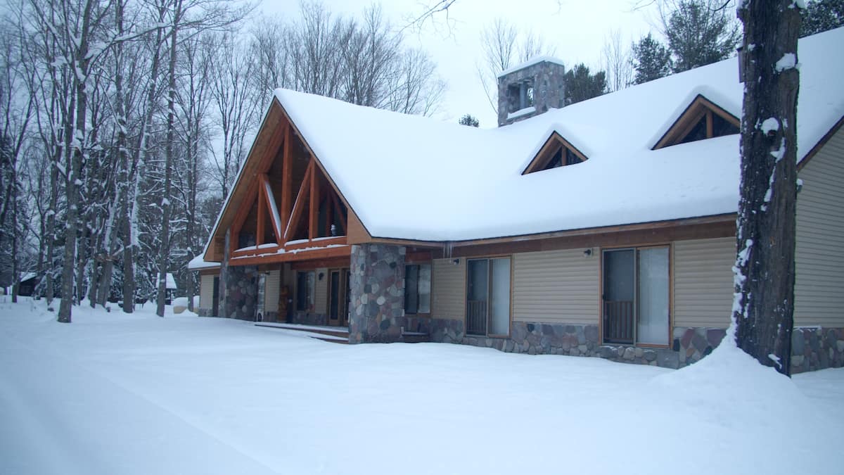 Bear’s Den Lodge surrounded by snow